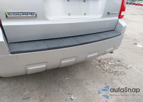 2009 Ford Escape Hybrid from USA, damaged, VIN 1FMCU49389KD10786